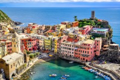 Scenic view of ocean and harbor in colorful village Vernazza, Cinque Terre